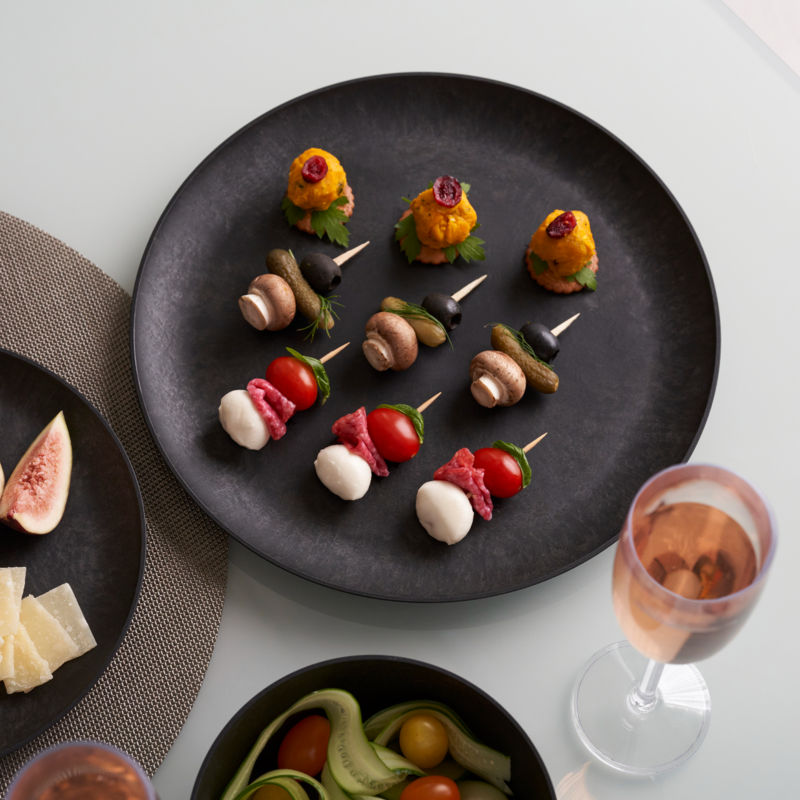 Letoa Collection 27cm Plate, Black | Designed by Kengo Kuma